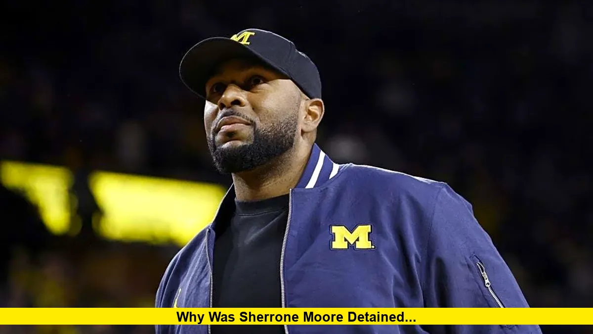 Why was Sherrone Moore detained